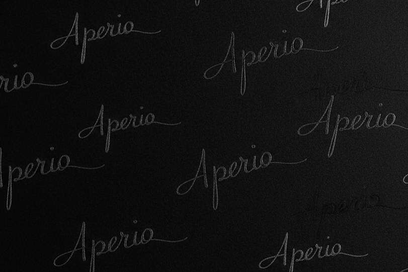 black background with the word Aperio all over in fancy signature writing